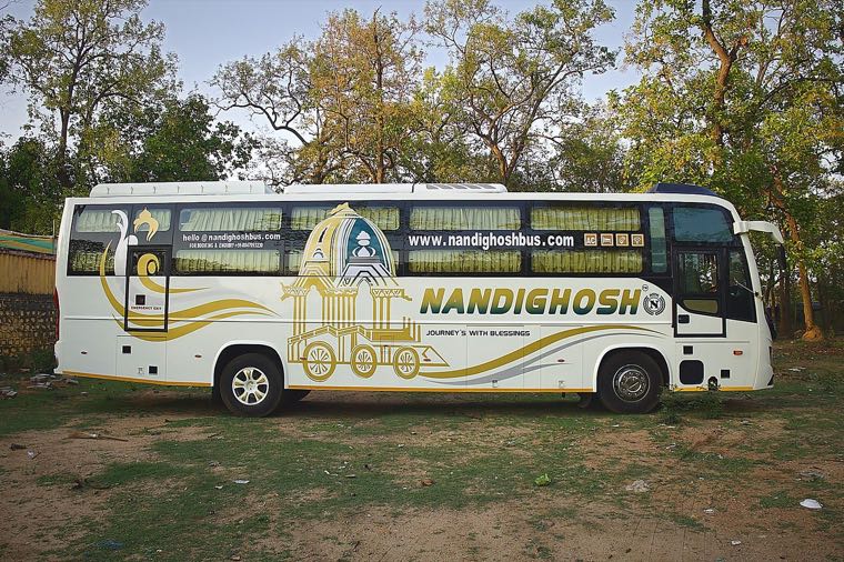 The Nandighosh Deluxe in daylight, a full side view of the chariot livery